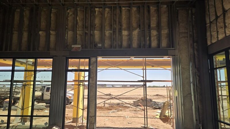 The Evolution of Commercial Garage Doors: From Steel to Smart Tech