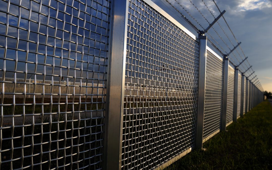 Understanding the Long-Term Benefits of Mesh Fencing in Ankeny, IA, for Your Property